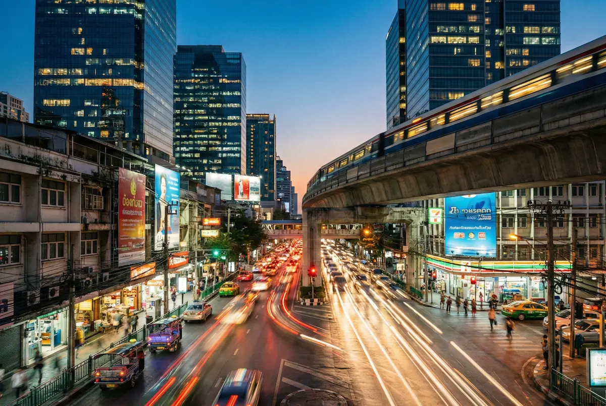 Busy city street in Thailand representing urban locations where TEFL interns can live and teach